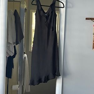 mid length w ruffles across chest and hem.